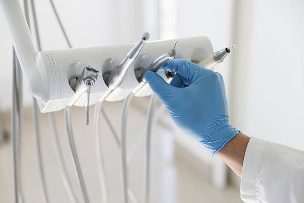 Professional Tooth Extraction technician working in Slaughterville, OK